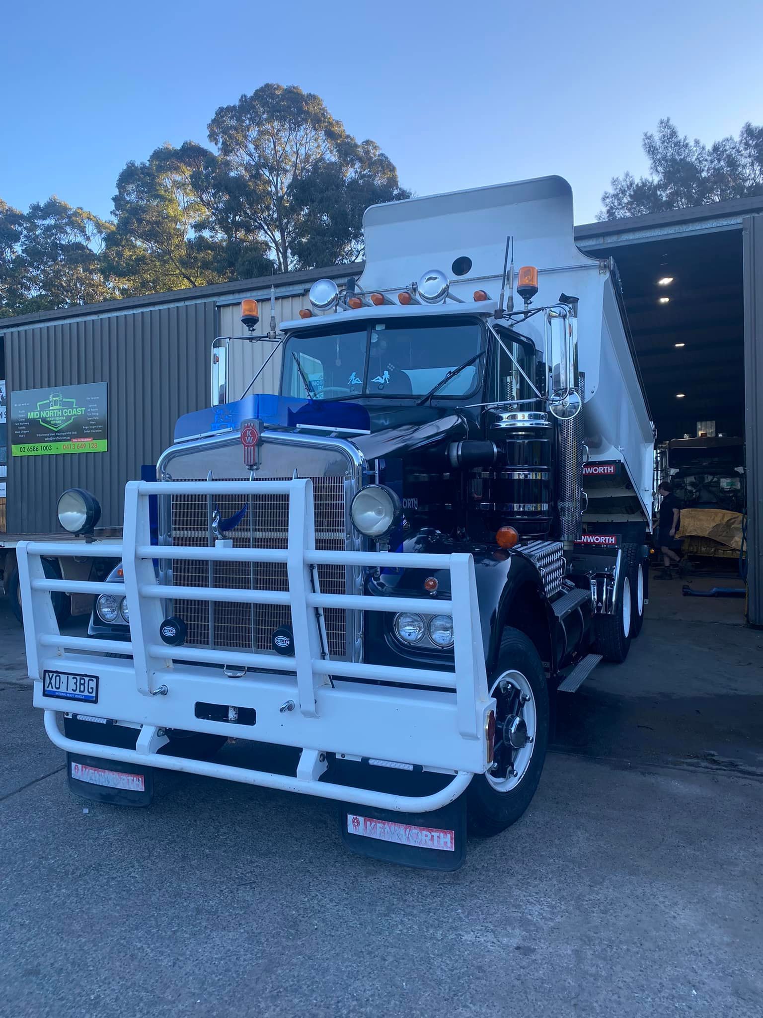 A Dump Truck With a White Bull Bar Parked Outside — Mid North Coast Heavy Vehicle Repairs In Kew, NSW