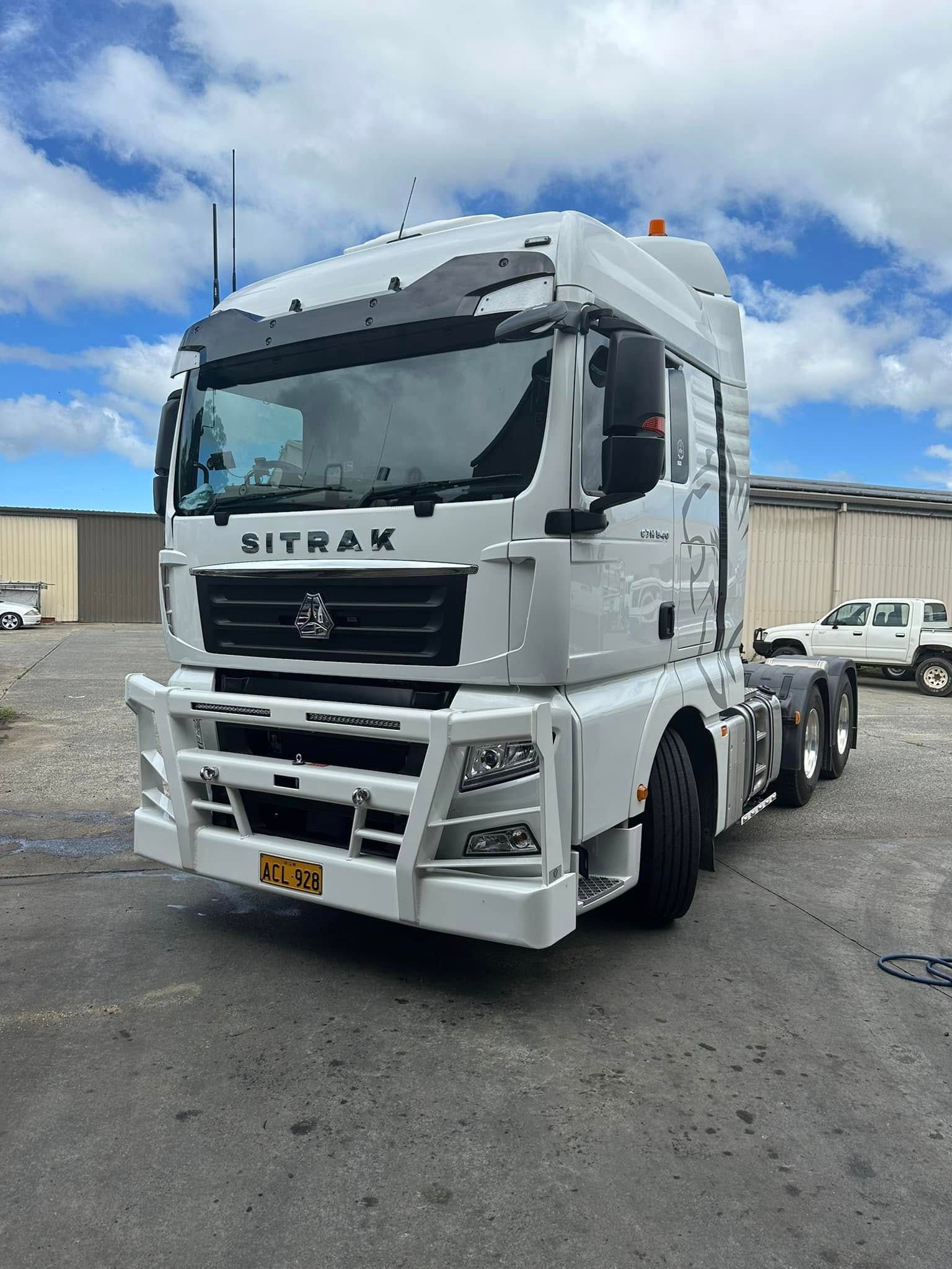 A White Sitrak Semi-truck With a Heavy-duty Bull Bar Parked — Mid North Coast Heavy Vehicle Repairs In Wauchope, NSW