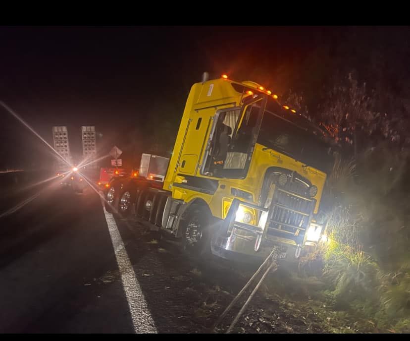 A Bright Yellow Semi-truck Has Veered Off the Road — Mid North Coast Heavy Vehicle Repairs In Wauchope, NSW