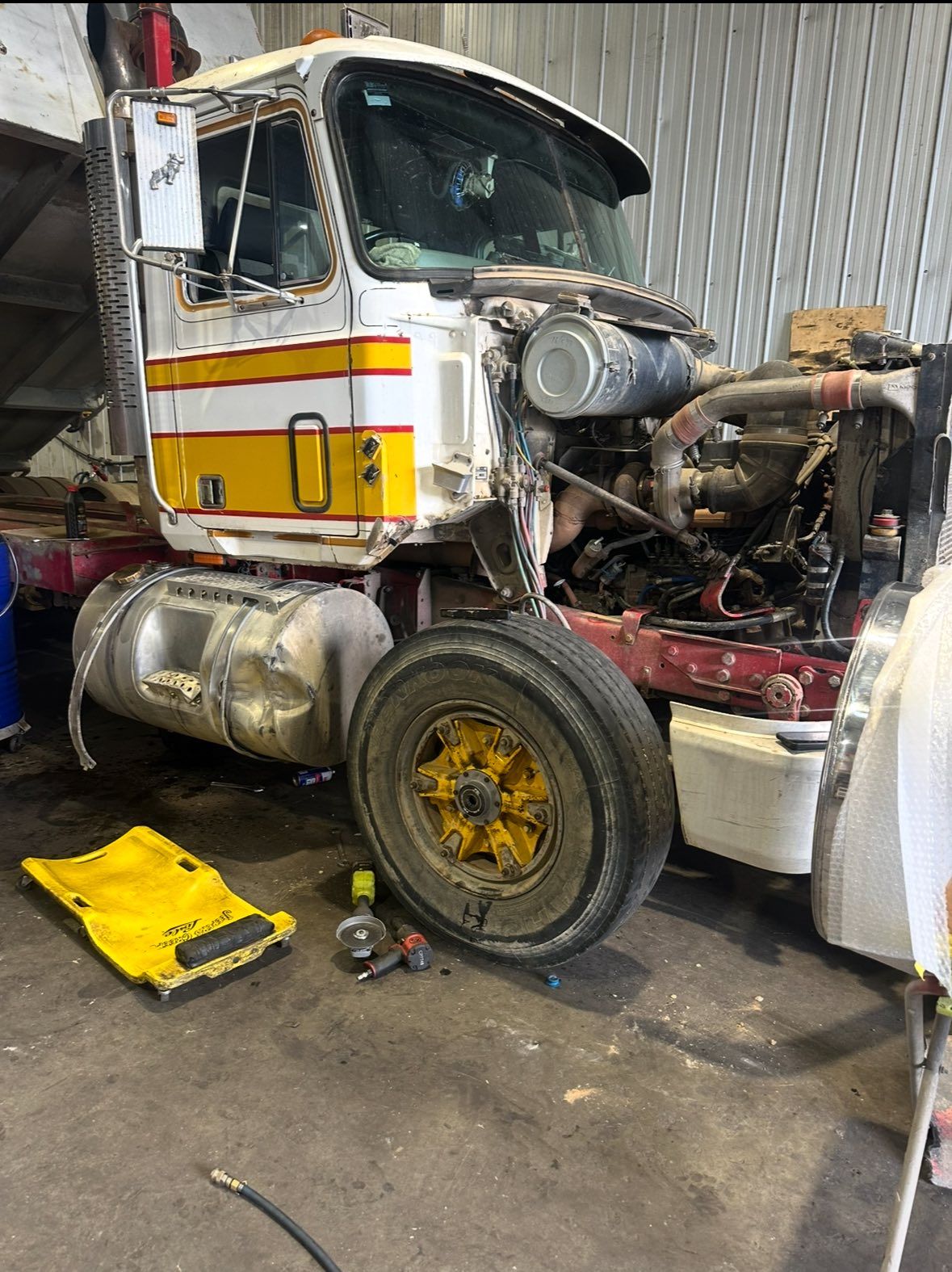 A Dump Truck With Its Hood Open for Maintenance — Mid North Coast Heavy Vehicle Repairs In Port Macquarie, NSW