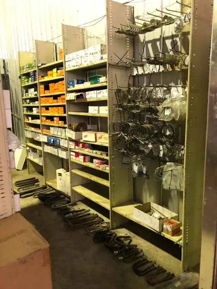 Metal Shelving Units Packed With Boxed Automotive Parts — Mid North Coast Heavy Vehicle Repairs In Wauchope, NSW