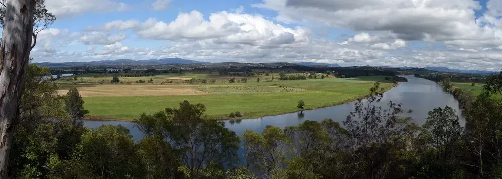 A River Flowing Through a Lush Green Valley — Mid North Coast Heavy Vehicle Repairs In Taree, NSW
