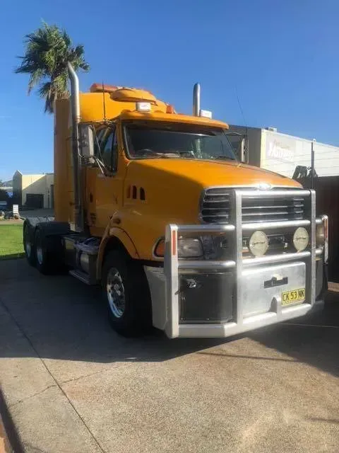 A Yellow Semi-truck With a Large Silver — Mid North Coast Heavy Vehicle Repairs In Wauchope, NSW