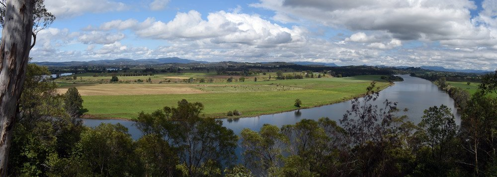 A Winding River Flowing Through a Lush Green Valley — Mid North Coast Heavy Vehicle Repairs In Taree, NSW