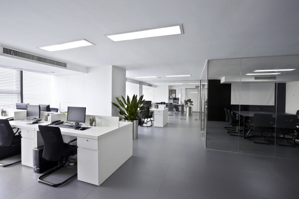 A Large Empty Office With A Lot Of Desks And Chairs — Wyong Commercial Cleaning In Morisset, NSW