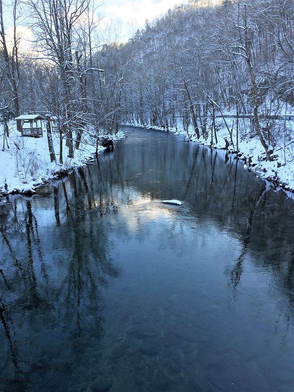 River and cabins