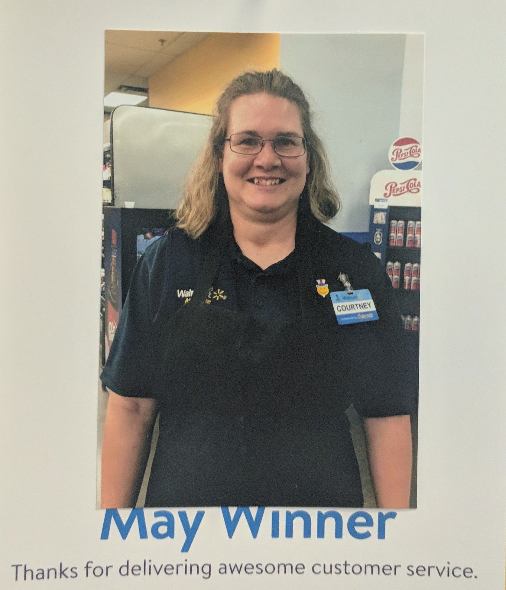 A picture of a woman with the words may winner on it