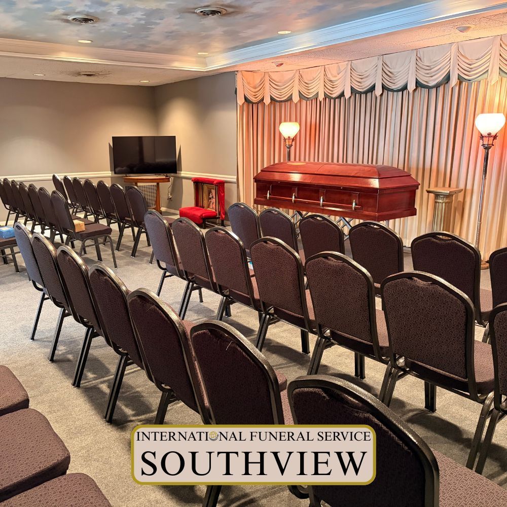 International Funeral Service Southview Trenton NJ - Funeral service room with rows of chairs, casket, TV.