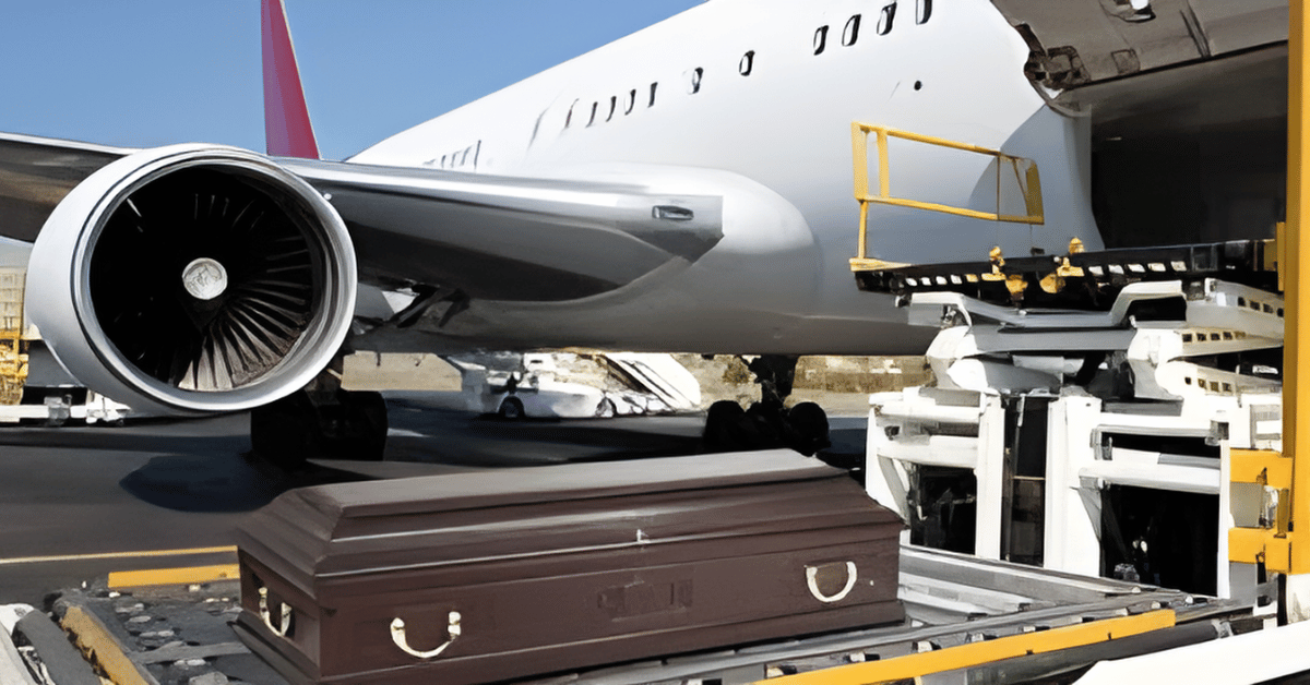 International Funeral Service Southview Trenton NJ - Coffin being loaded onto a cargo cart beside a jet on an airport tarmac