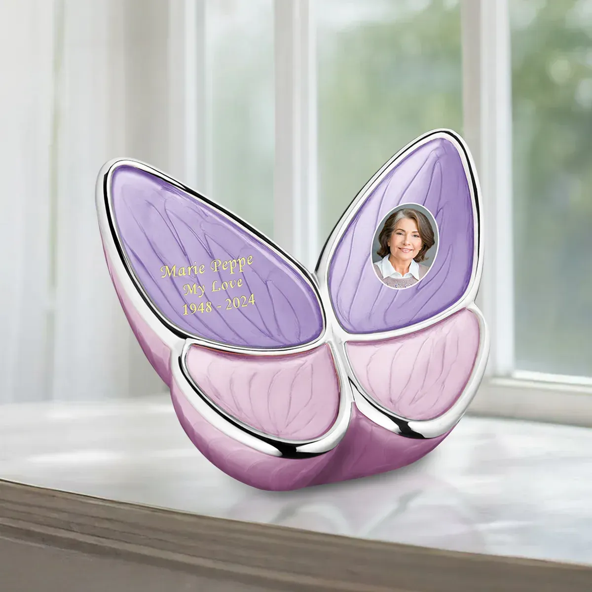 International Funeral Service Southview Trenton NJ - Purple butterfly-shaped keepsake with gold script & a circular portrait.