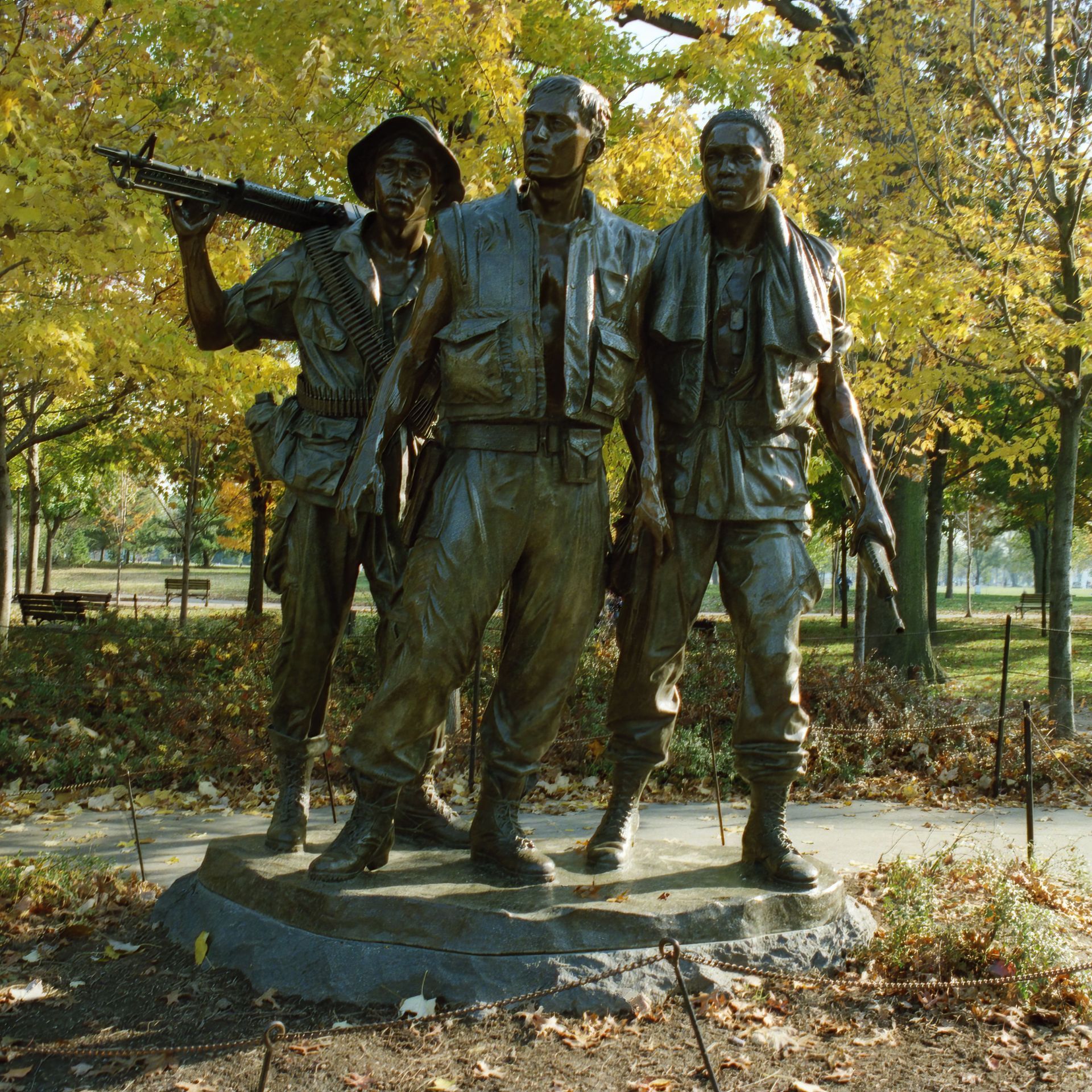International Funeral Service Southview Trenton NJ - Three bronze statues stand in a leafy park, one holding a rifle.