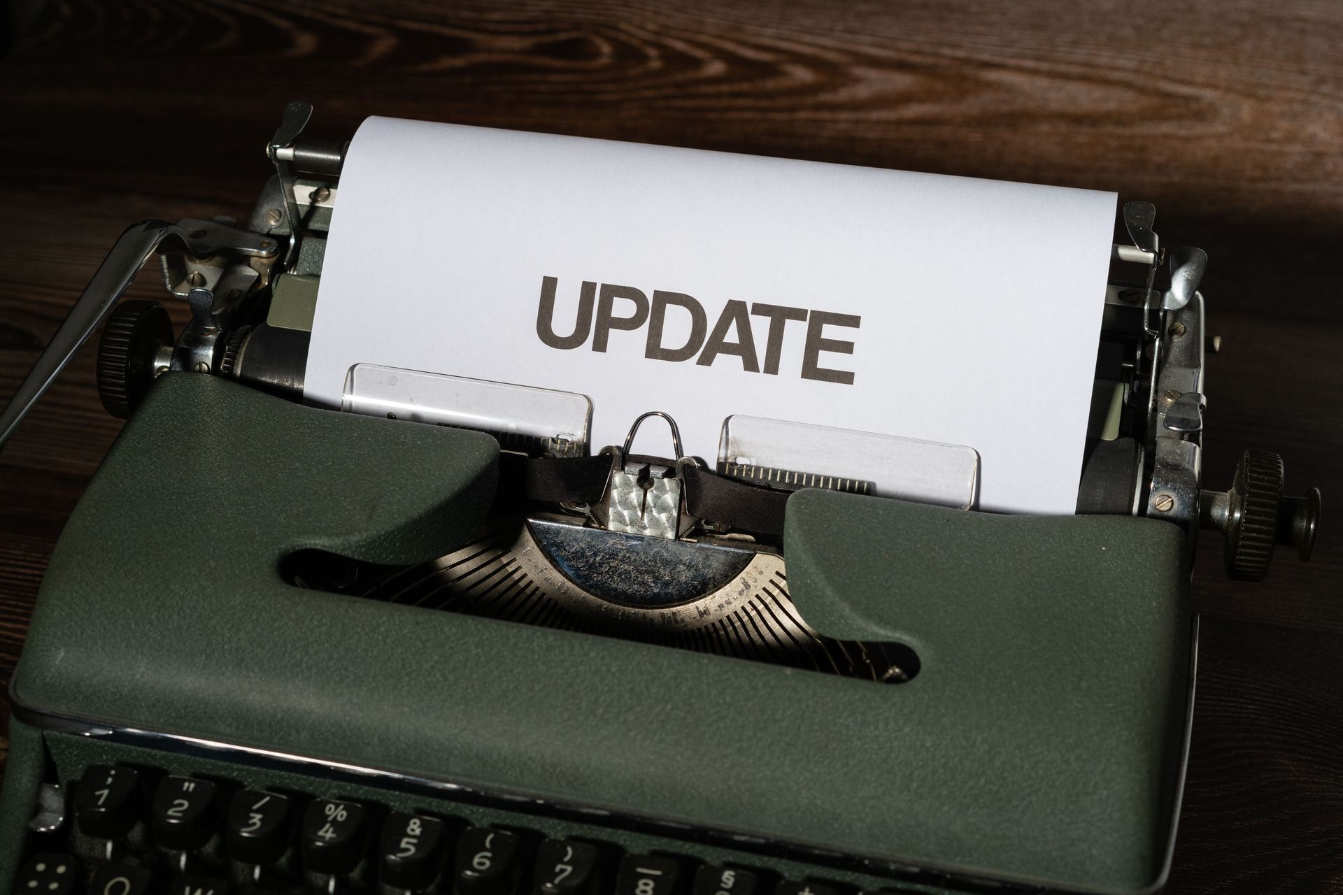 International Funeral Service Southview Trenton NJ - Vintage typewriter with a sheet reading “UPDATE” on the platen