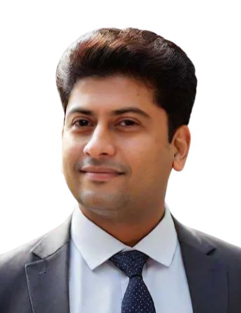 Portrait of a man in a gray suit and tie against a white background