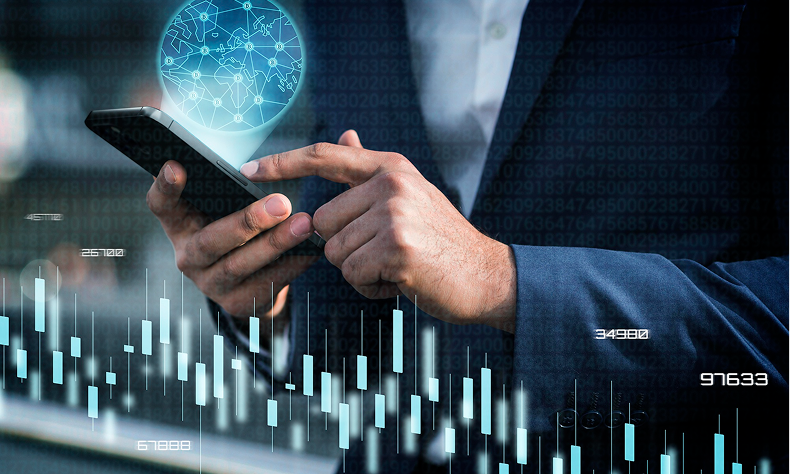 Businessperson using a smartphone with digital data charts and holographic interface