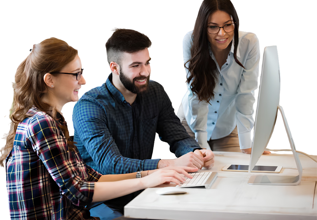 Three coworkers collaborating at a desktop computer in a bright office