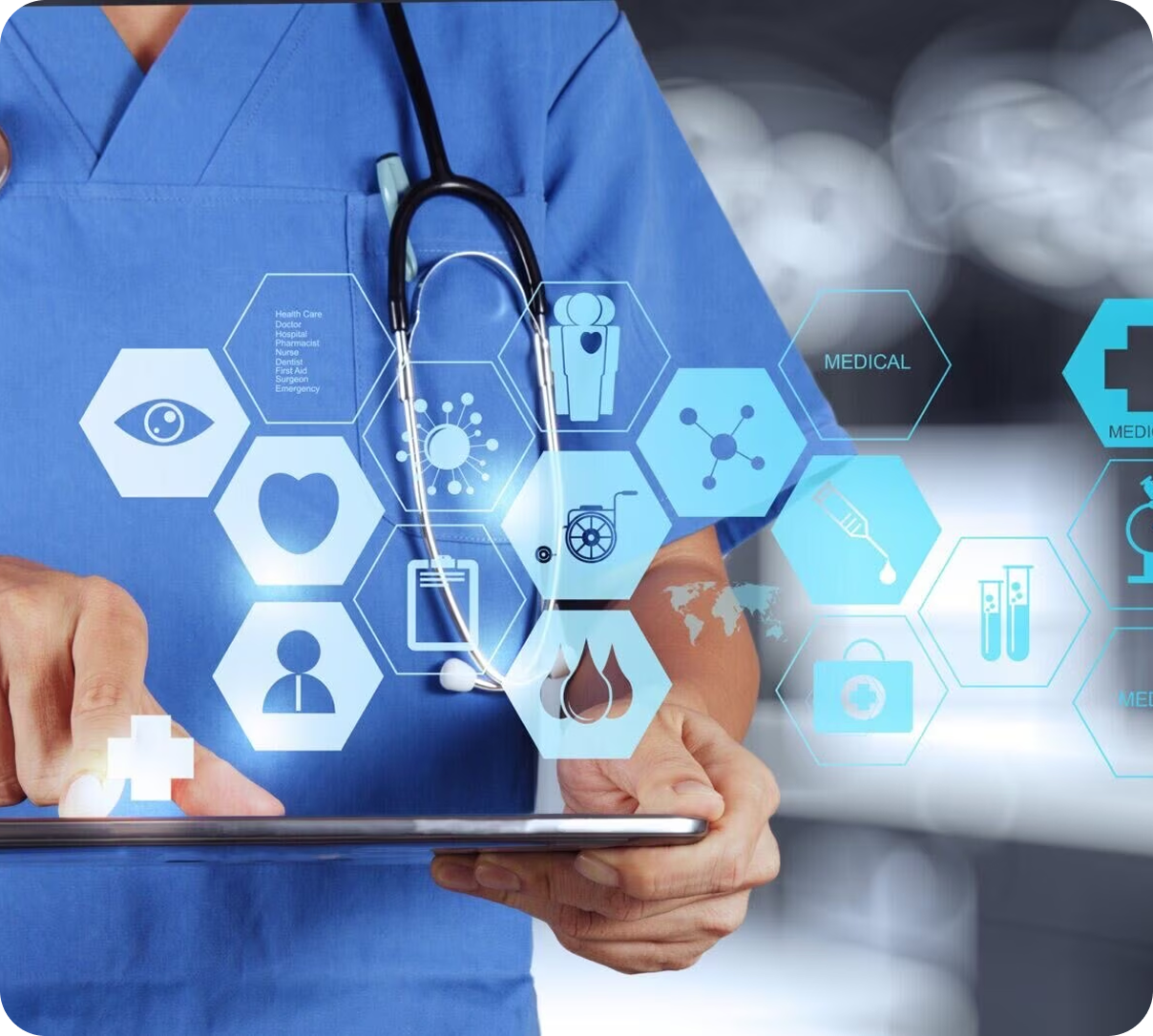 Doctor in blue scrubs using a tablet with medical health icons overlayed