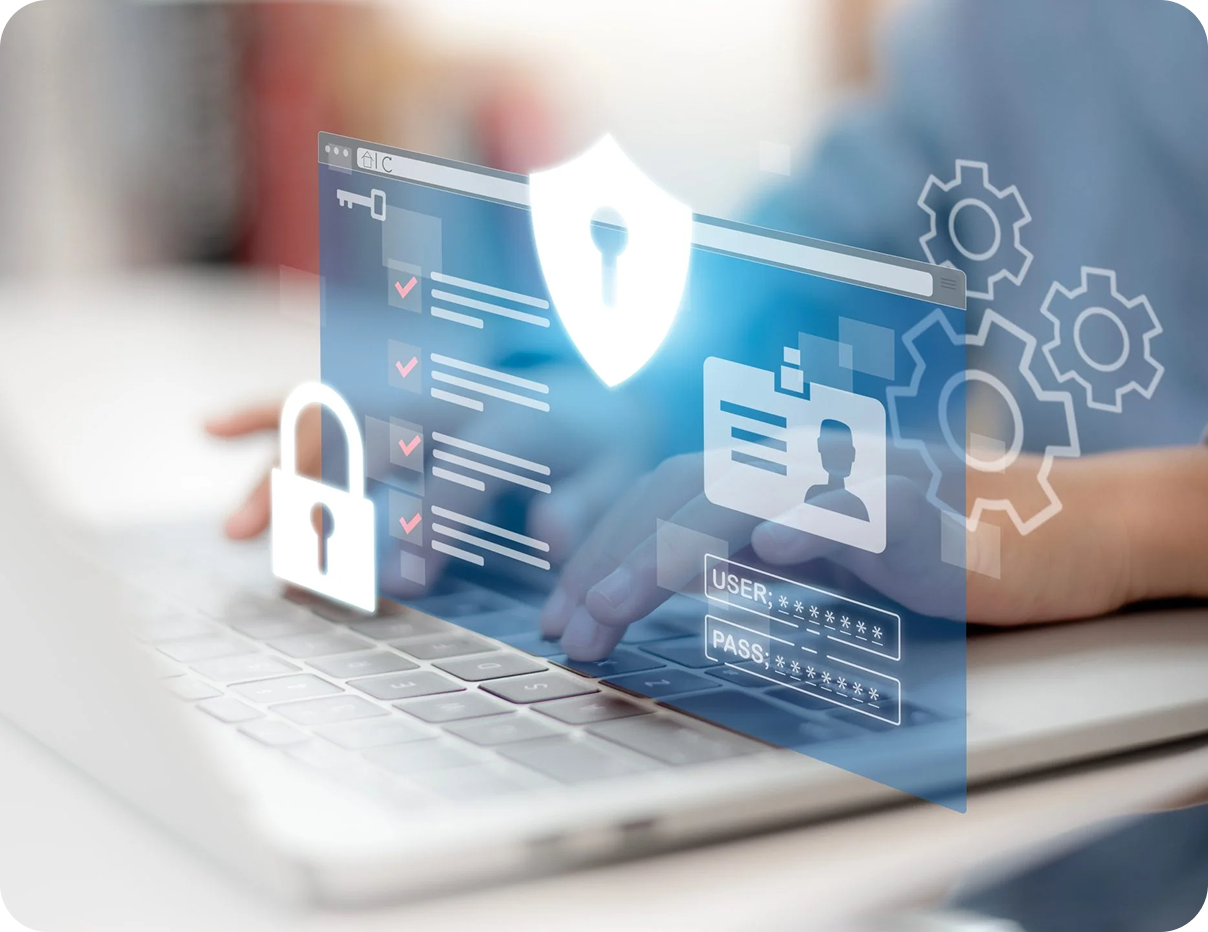 Laptop with translucent cybersecurity icons, including shield, padlock, and settings gears, over a blurred desk scene