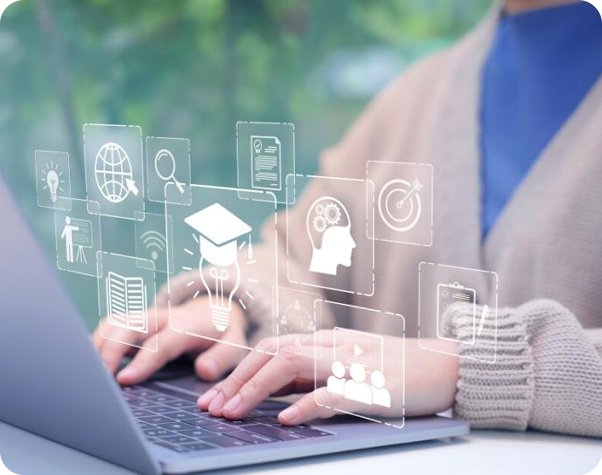 Hands typing on a laptop with translucent education and technology icons overlaid.