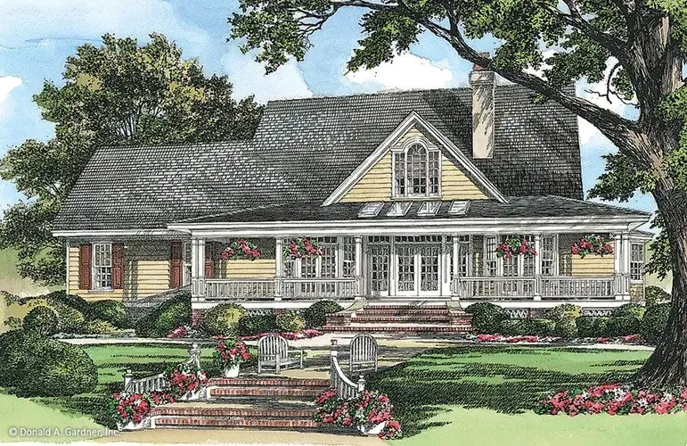 Yellow house with a wraparound porch, front garden, and steps.