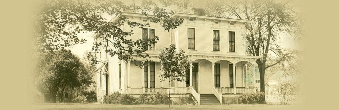 Sepia sketch of a large historic house with trees and a front porch