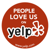 Red Yelp sticker reading “People love us on yelp” in white and black text on an orange circle.