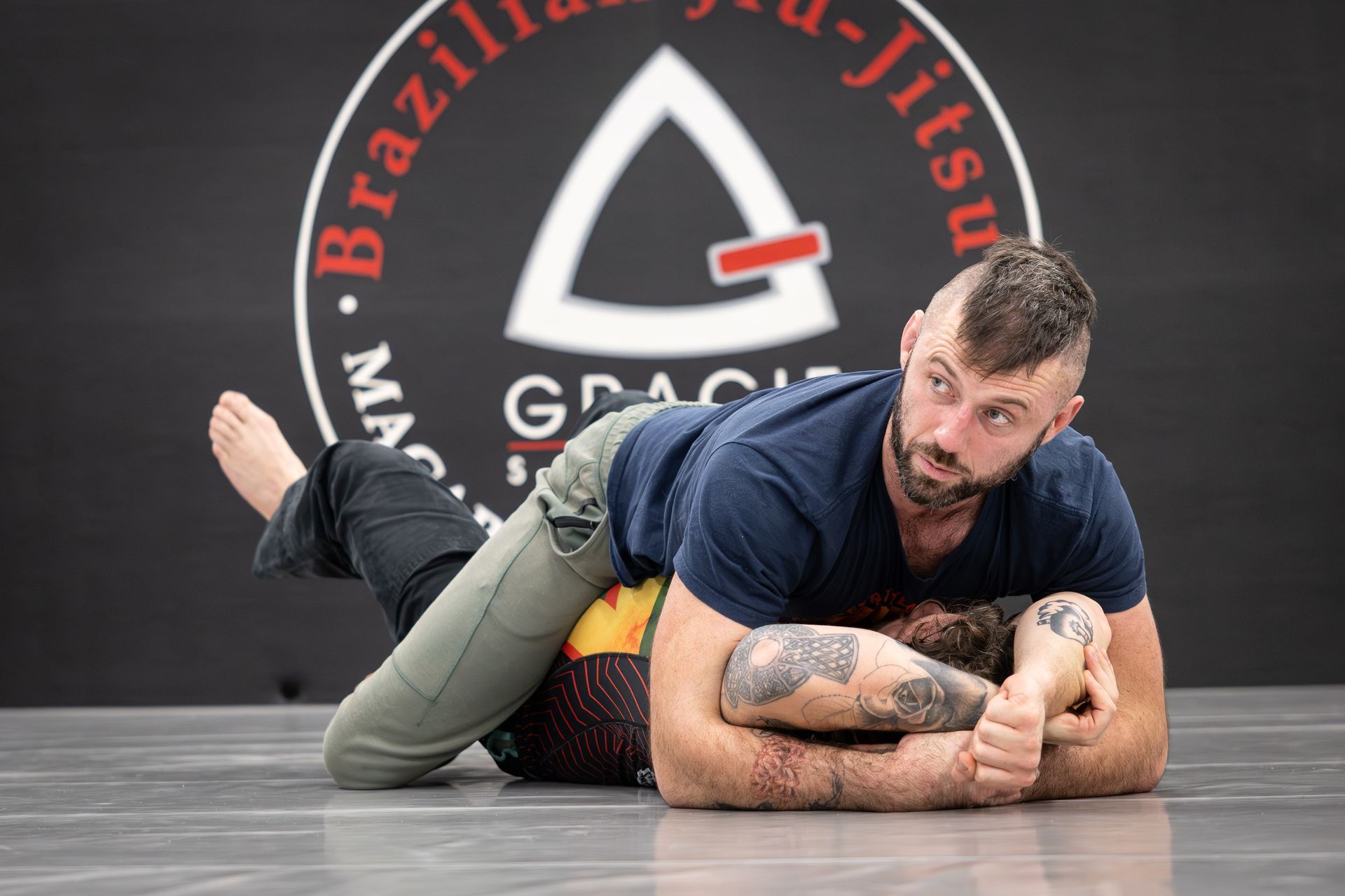 Adults drilling Brazilian Jiu-Jitsu techniques at Soulcraft Martial Arts in Hamden, CT for fitness.