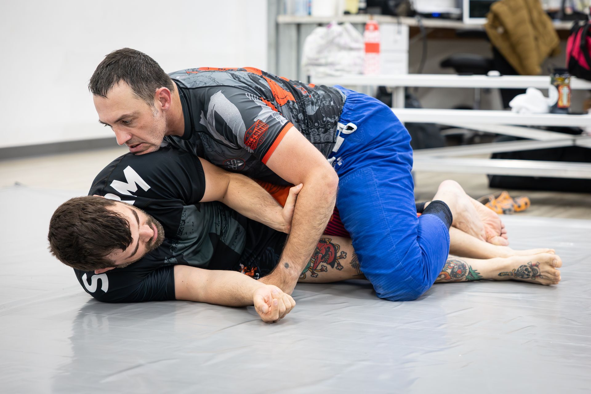 Adults drilling Brazilian Jiu Jitsu techniques at Soulcraft Martial Arts in Hamden, CT for fitness and confidence