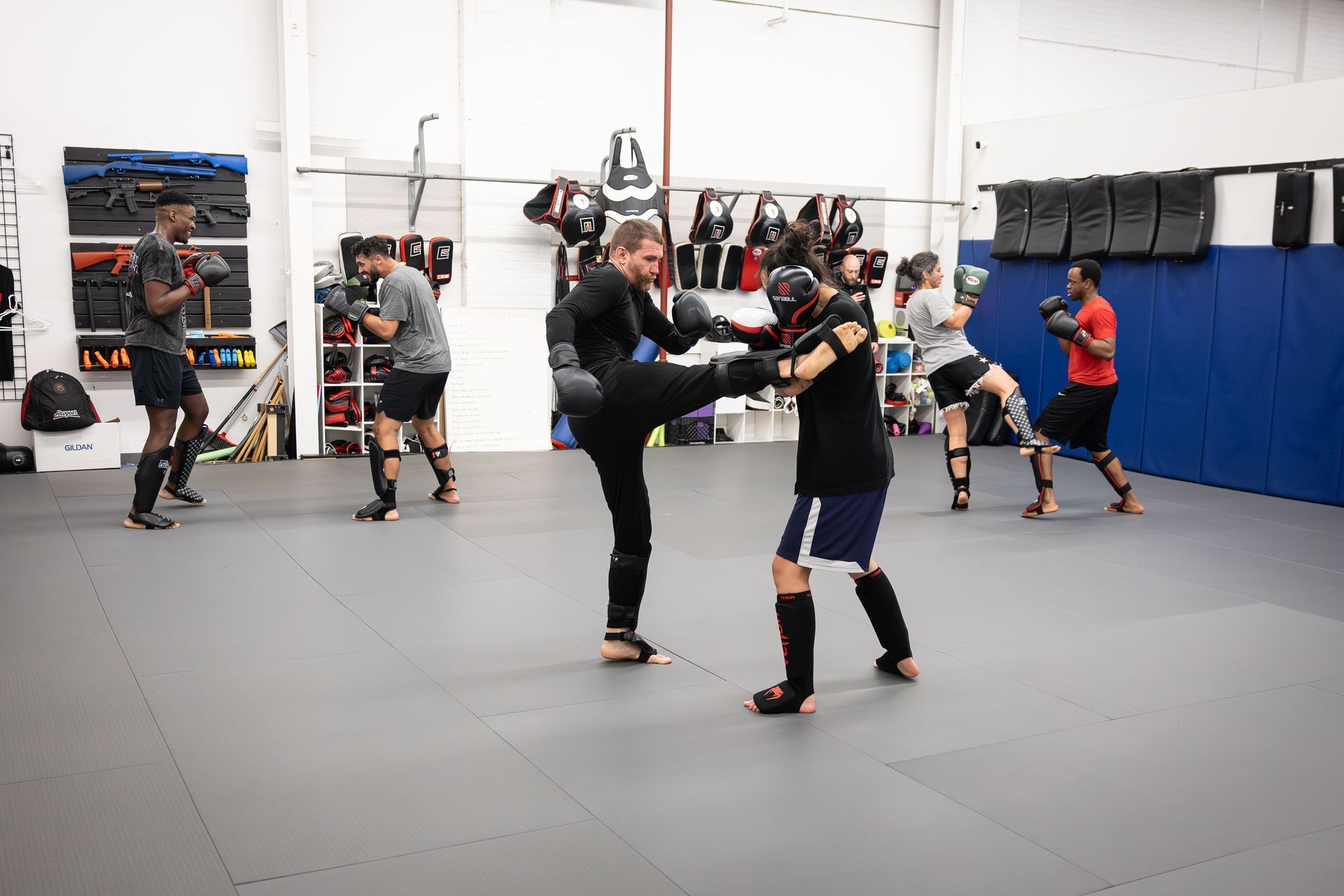 Adult students drilling Jiu-Jitsu fundamentals at Soulcraft Martial Arts in Hamden, CT to build confidence and focus.