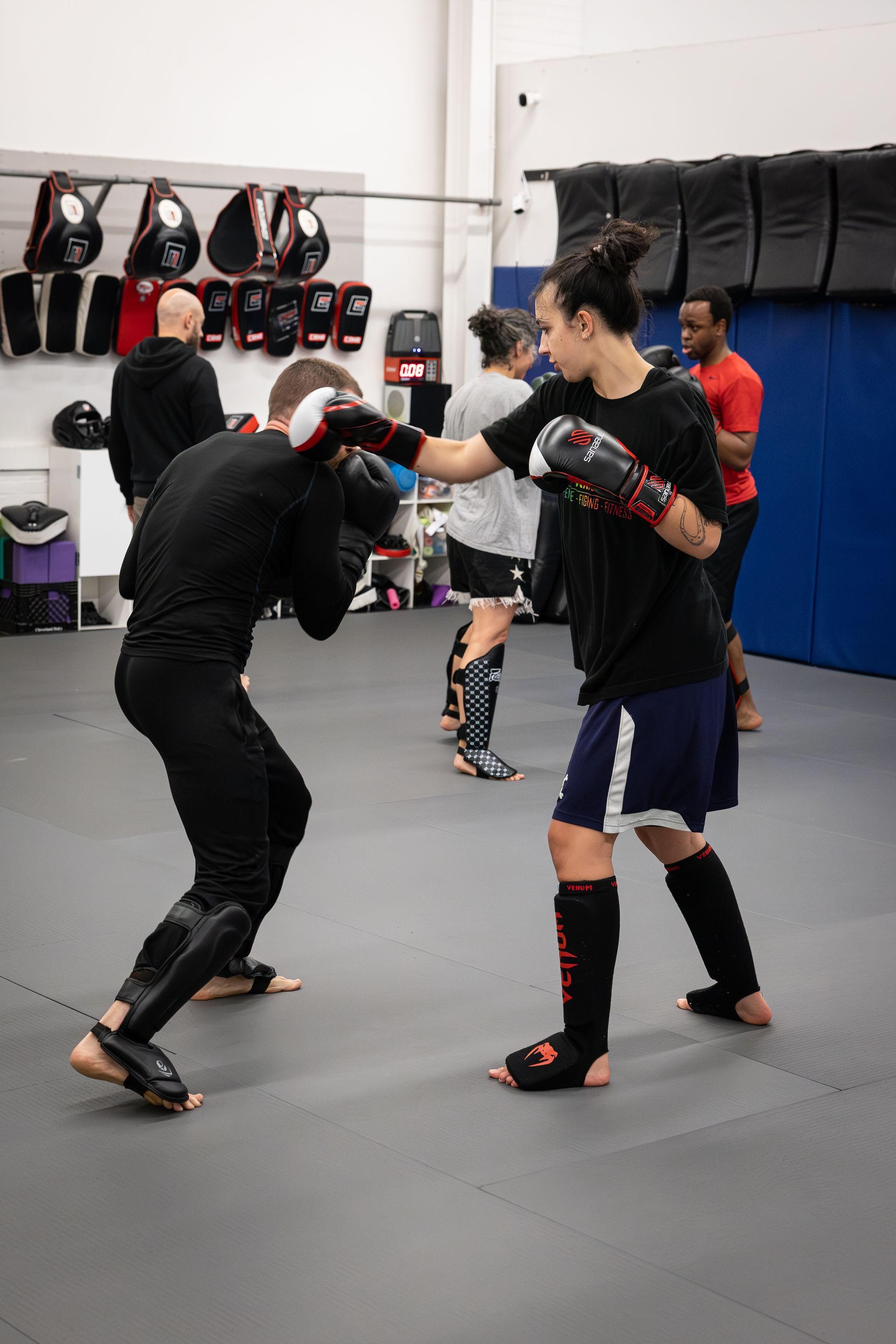Partners drill Brazilian Jiu-Jitsu technique at Soulcraft Martial Arts in Hamden, CT to build fitness and focus.