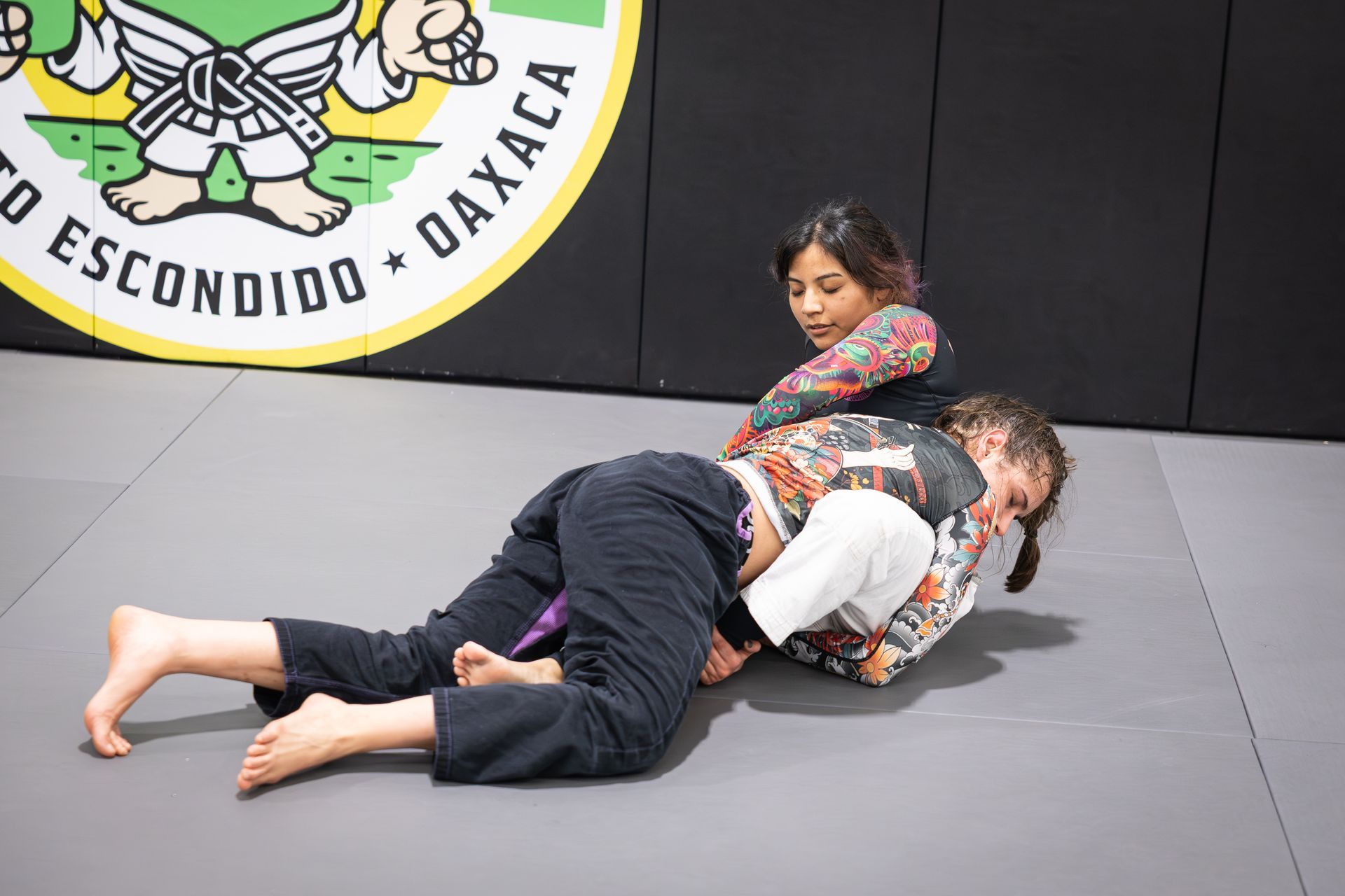 Adults drilling Brazilian Jiu-Jitsu technique at Soulcraft Martial Arts in Hamden, CT to build confidence and focus.