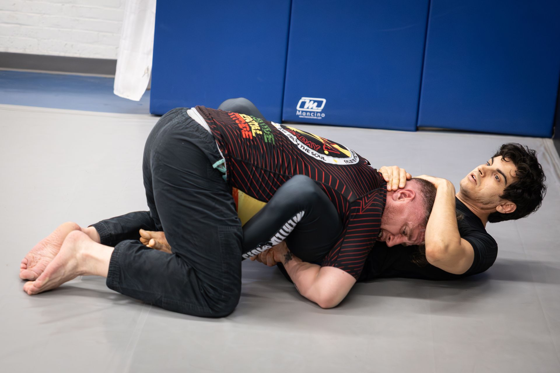 Beginners practice Brazilian Jiu-Jitsu drills at Soulcraft Martial Arts in Hamden, CT.