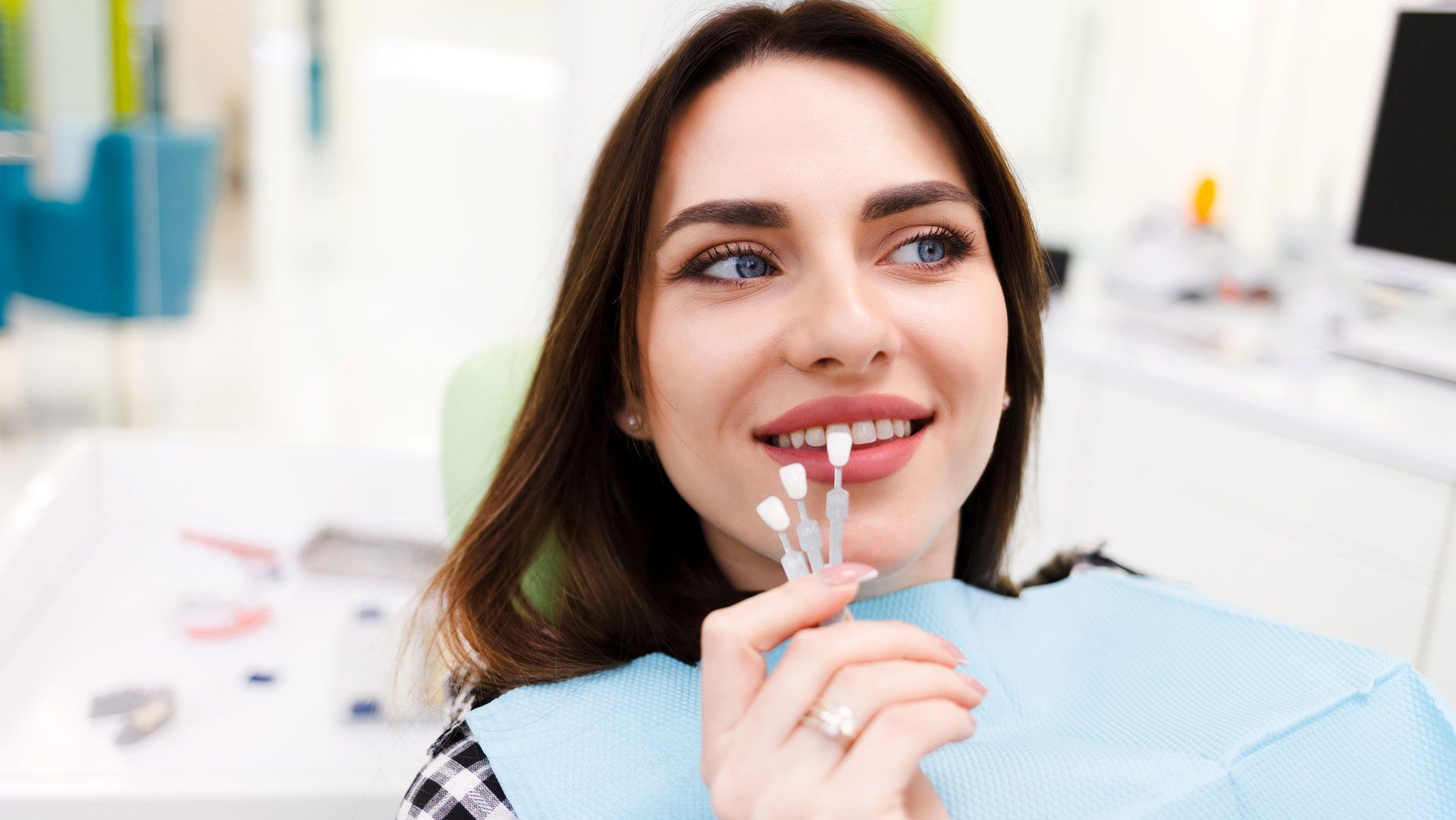 Patient Choosing Color of Veneers — Joelton, TN — Wingo Family Dentistry