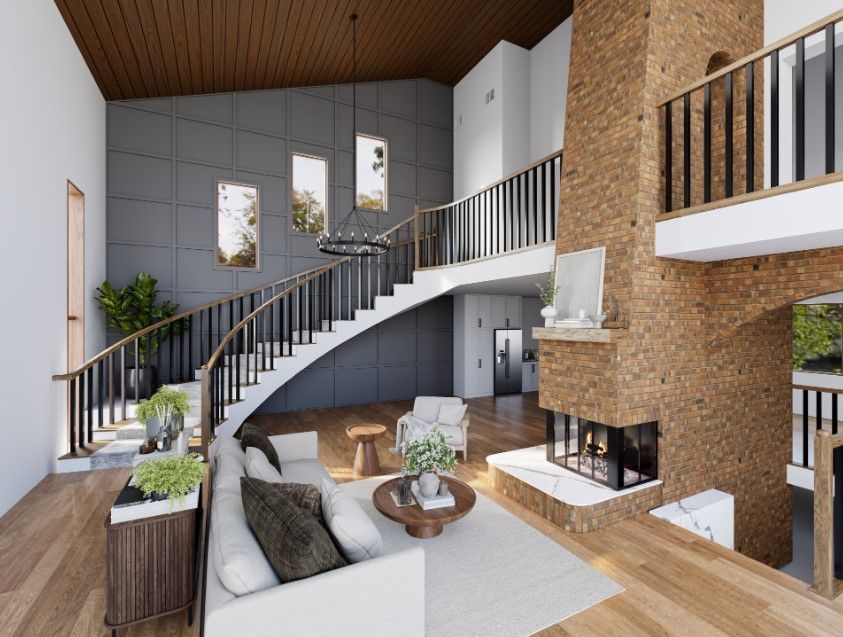 A living room with a curved staircase and a fireplace.