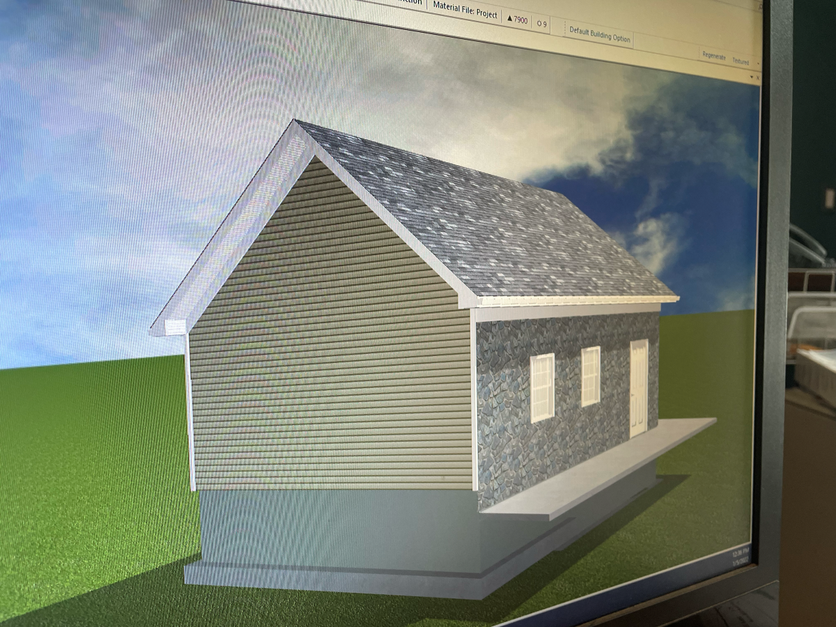 3D rendering of a small house with gray siding, gray roof, and three windows on a computer screen.