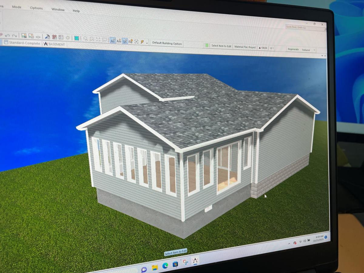 3D rendering of a house design on a computer screen, showing exterior with blue sky background.