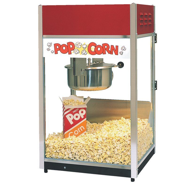 Popcorn machine with red top, glass sides, and a metal kettle, filled with popcorn kernels and popped corn.
