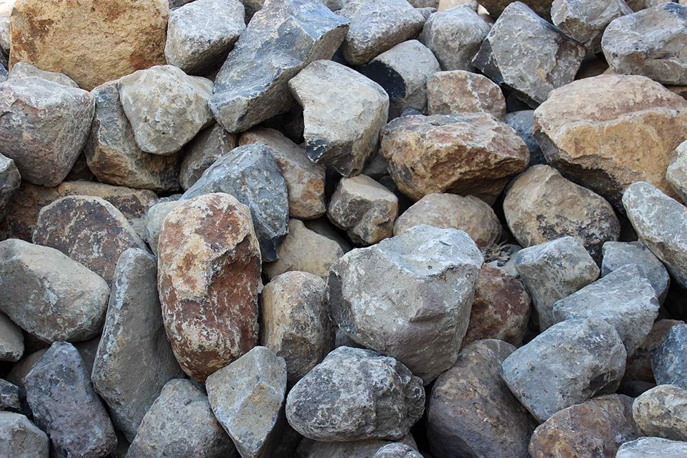 A Pile of Rocks Sitting on Top of Each Other — Caloundra Landscape Supplies in Warana, QLD