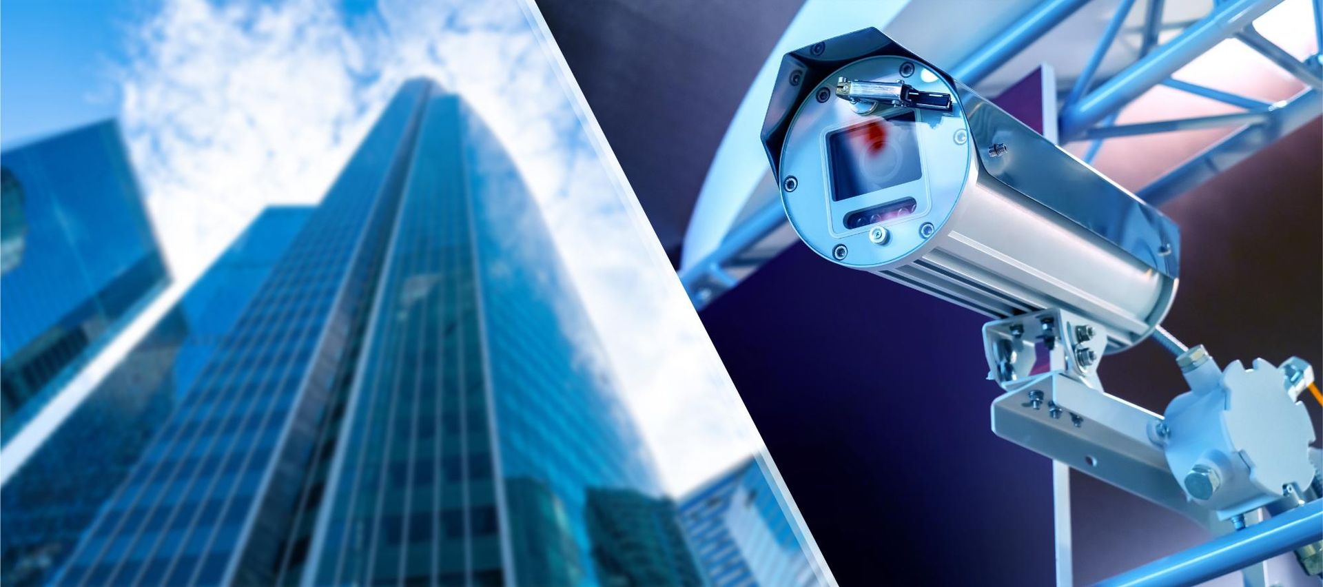 A security camera is sitting in front of a tall building.