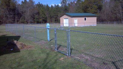 Chain Link Fence With Gate — Wilmington, NC — J & J Fence Chain Link Fence With Gate — Wilmington, NC — J & J Fence