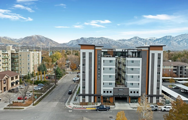 Aerial view of Tradition Pointe building with the mountains in the background.