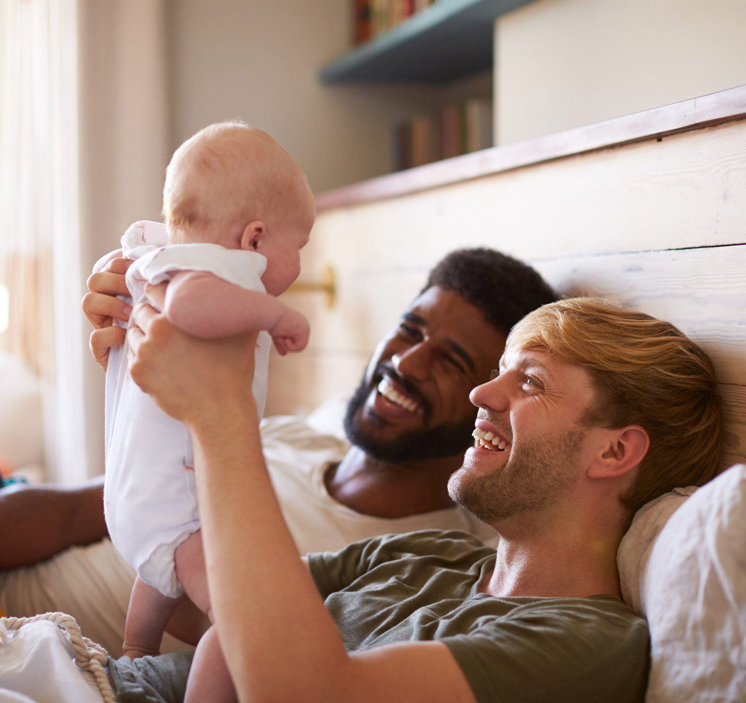 Happy Couple With Adopted Baby — Chelmsford, MA — Kurland & Grossman PC Happy Couple With Adopted Baby — Chelmsford, MA — Kurland & Grossman PC
