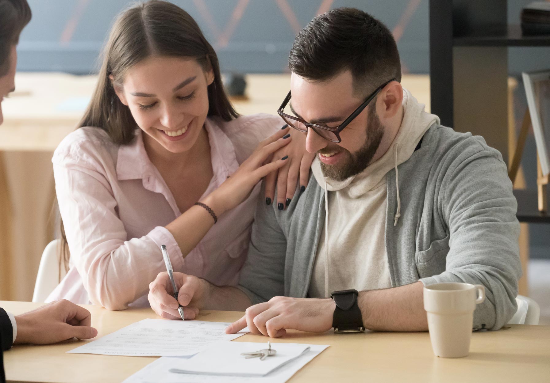 Couple Signing Prenuptial Agreement — Chelmsford, MA — Kurland & Grossman PC Couple Signing Prenuptial Agreement — Chelmsford, MA — Kurland & Grossman PC