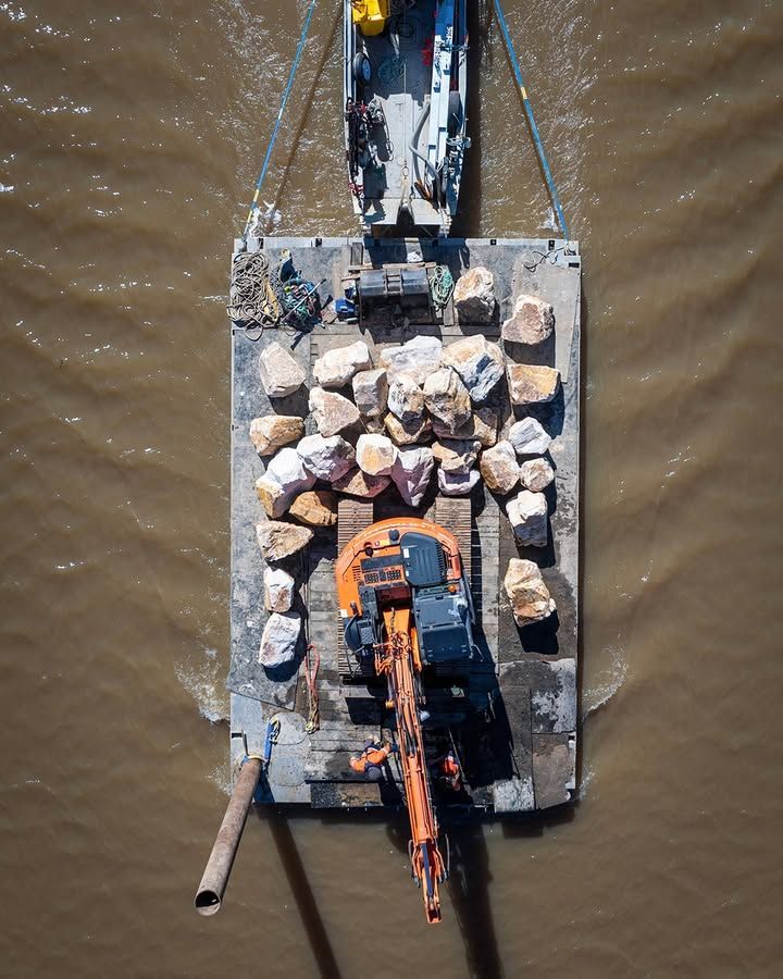 Overhead View of A Barge with Rocks, an Excavator, and A Smaller Boat on A River — M&J Marine Services in Medowie, NSW