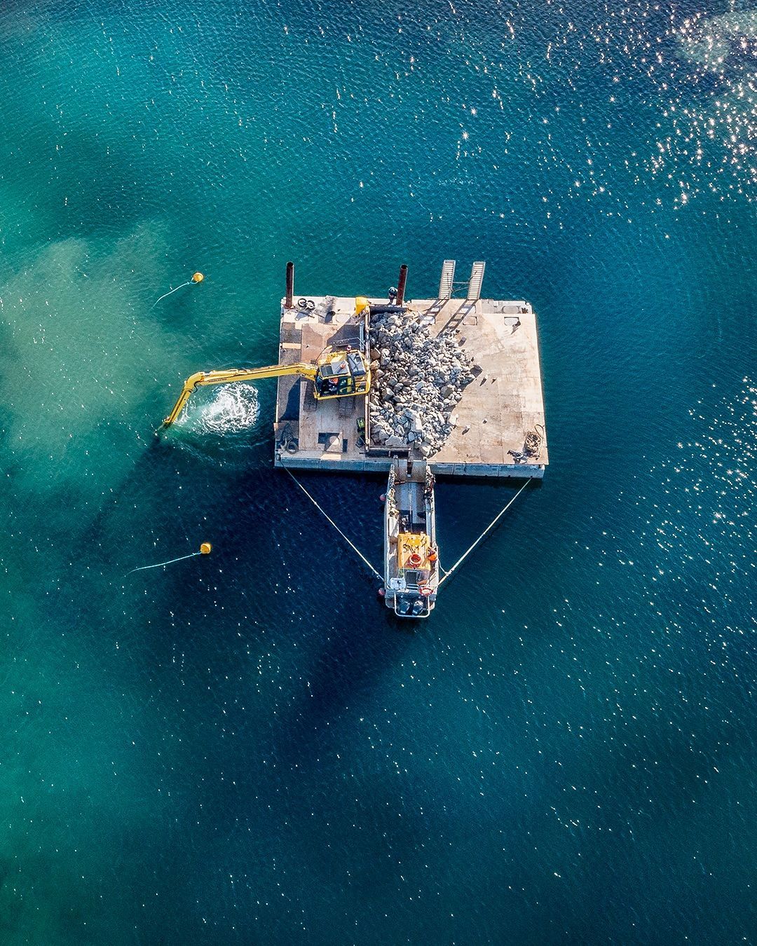 Platform with Equipment Surrounded by Water, Connected to A Boat — M&J Marine Services in Forster, NSW