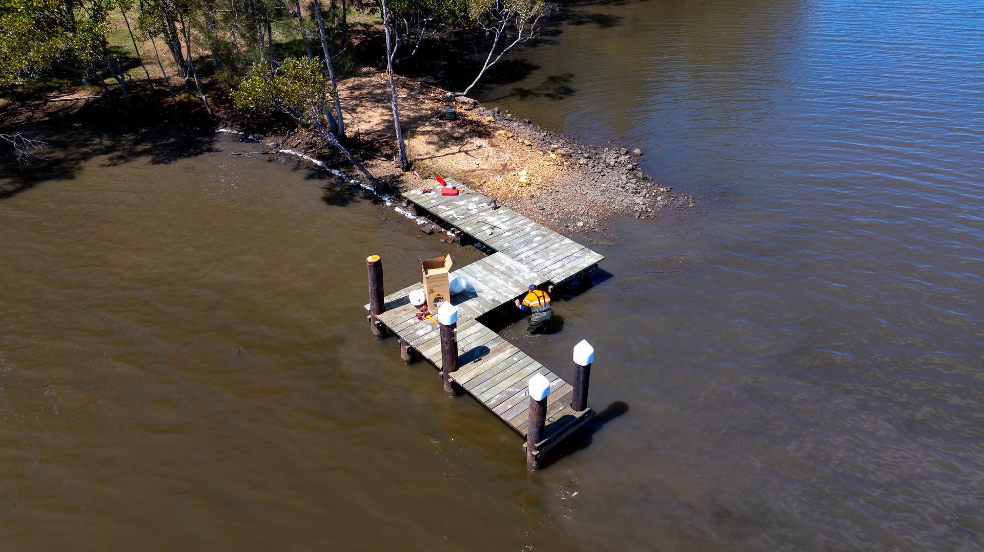 An Aerial View of A Wooden L Shaped Dock — M&J Marine Services in Medowie, NSW