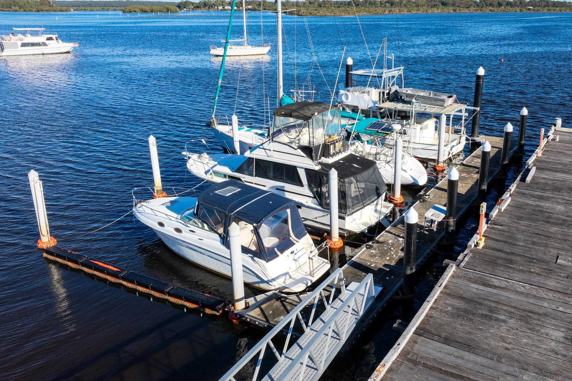 A High Angle View of White Boats Docked in A Marina — M&J Marine Services in Forster, NSW