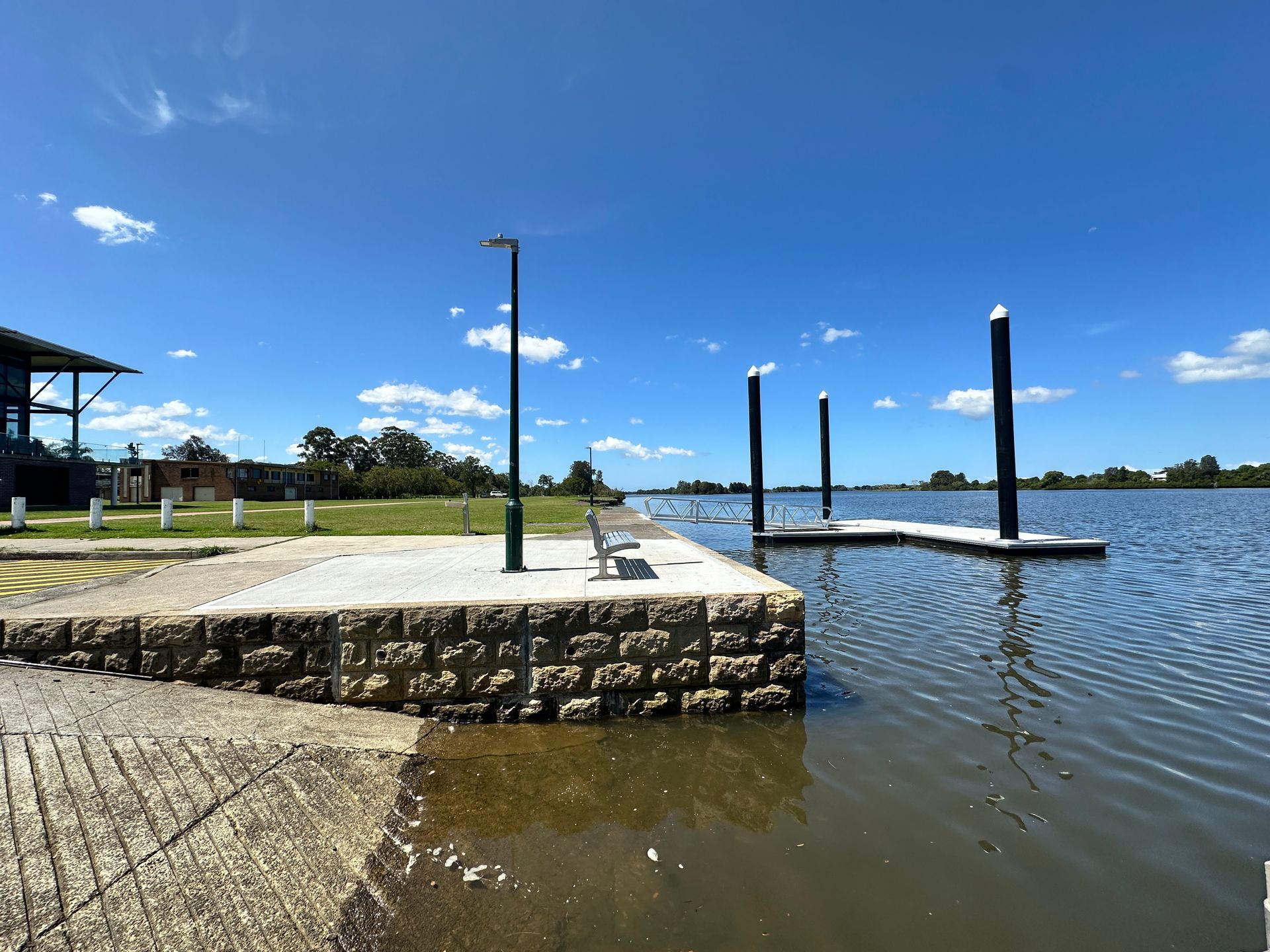 A Boat Ramp Leading to A Stone Pier — M&J Marine Services in Coffs Harbour, NSW