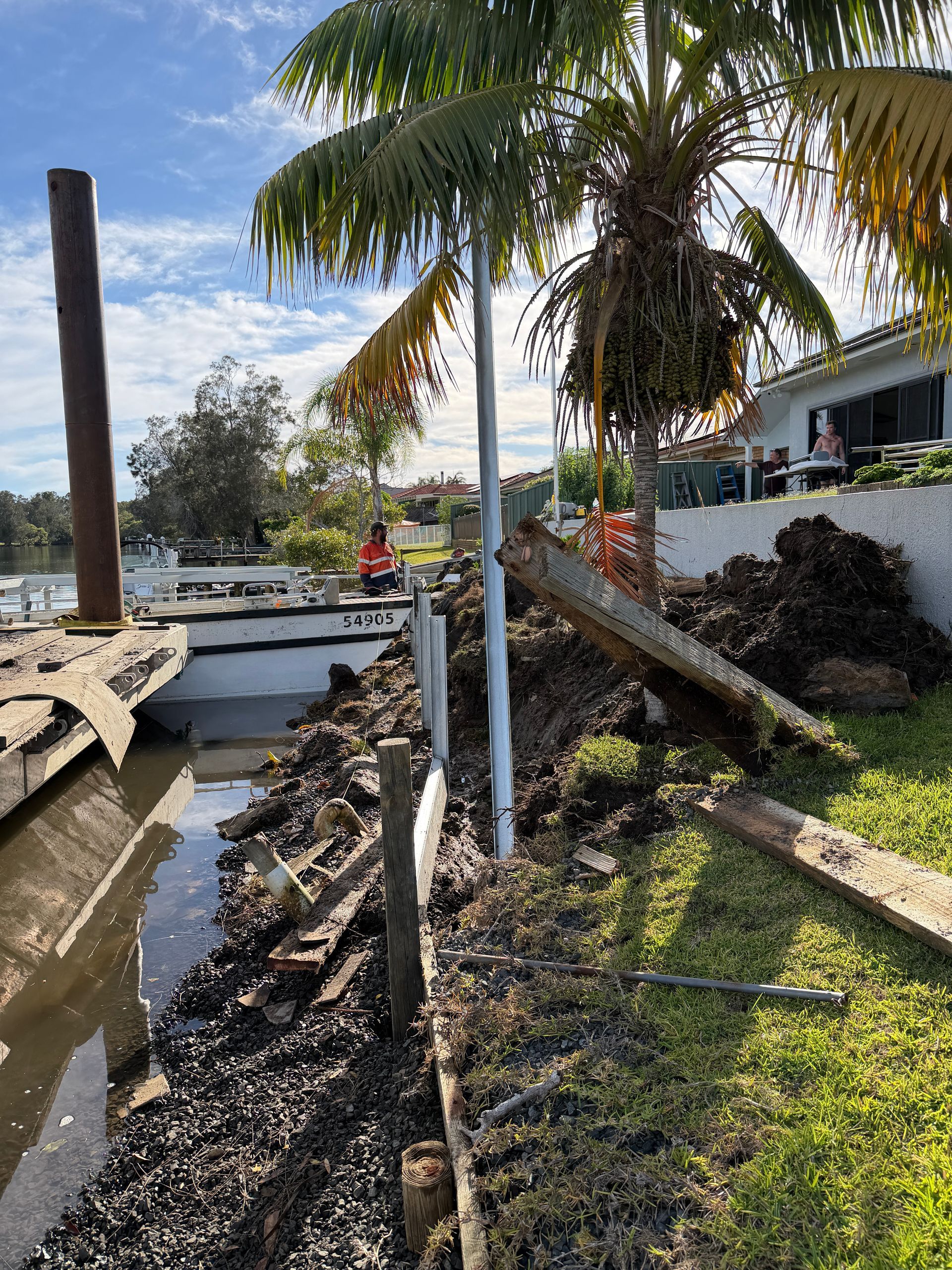 A Partially Collapsed Wooden Waterfront Retaining Wall — M&J Marine Services in Newcastle, NSW