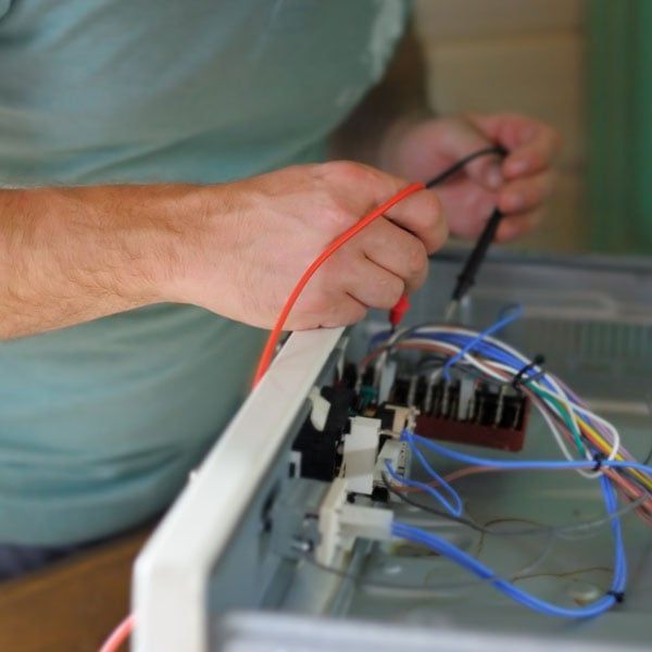 Technician working with wires