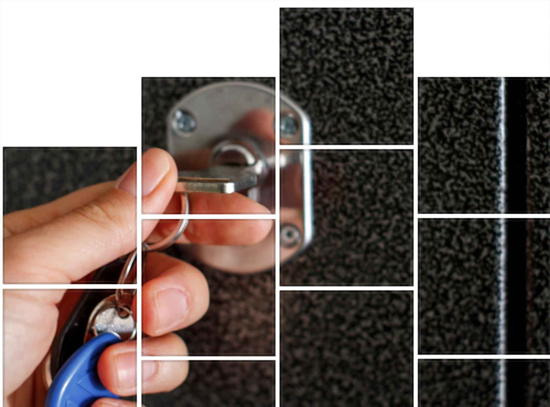 Hand inserting a key into a door lock on a textured dark surface; a blue key fob hangs from the ring.